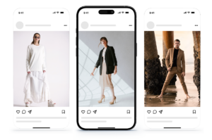 Auf drei Smartphones sind Social-Media-Beiträge zu sehen, auf denen jeweils eine Person in stilvollen Outfits posiert – eine Frau in Weiß, eine Frau im Blazer und ein Mann in einem beigen Anzug, der barfuß am Strand steht –, was kreative Strategien für das Social-Media-Marketing durch visuell ansprechende Inhalte verdeutlicht.
